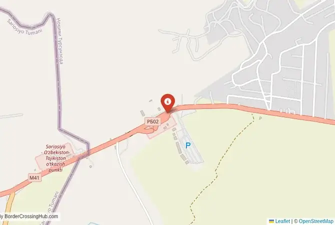 Close-up map showing a border crossing point with marker at the selected land port of entry between Uzbekistan and Tajikistan