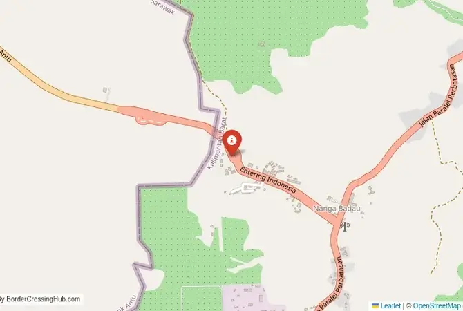 Close-up map showing a border crossing point with marker at the selected land port of entry between Indonesia and Malaysia
