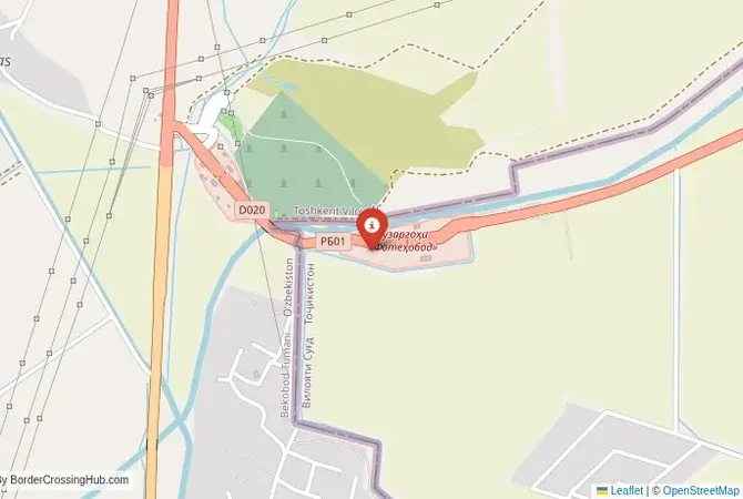 Close-up map showing a border crossing point with marker at the selected land port of entry between Uzbekistan and Tajikistan