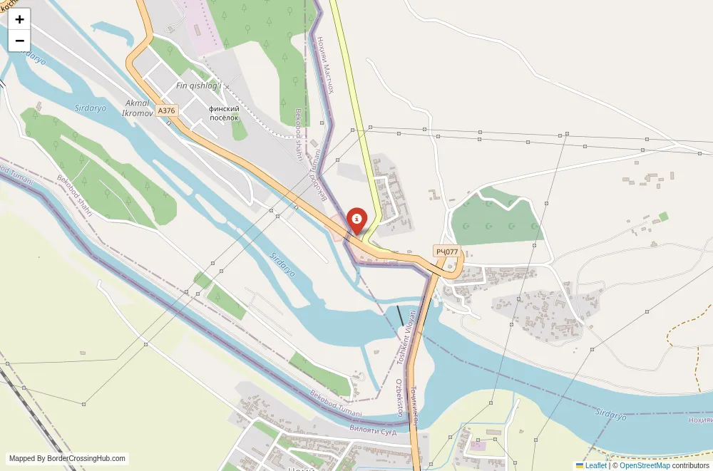 Close-up map showing a border crossing point with marker at the selected land port of entry between Uzbekistan and Tajikistan