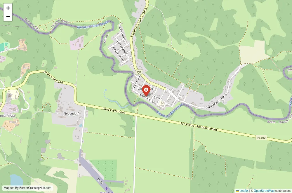 Close-up map showing a border crossing point with marker at the selected land port of entry between Mexico and Belize